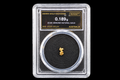 Australian gold nugget in sealed slab, 0.189g, 23.8K, serial SGE-2026-00134, black background
