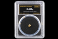 California gold nugget in sealed slab, 0.430g, 19K, serial SGE-2026-00118, black background