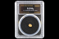 Colorado gold nugget in sealed slab, 0.316g, 21.1K, serial SGE-2026-00108, black background