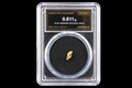 Australian gold nugget in sealed slab, 0.611g, 19.2K, serial SGE-2026-00114, black background
