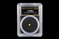 0.399g Australian natural gold nugget labeled 22.9K in sealed slab SGE-2026-00132 on black background